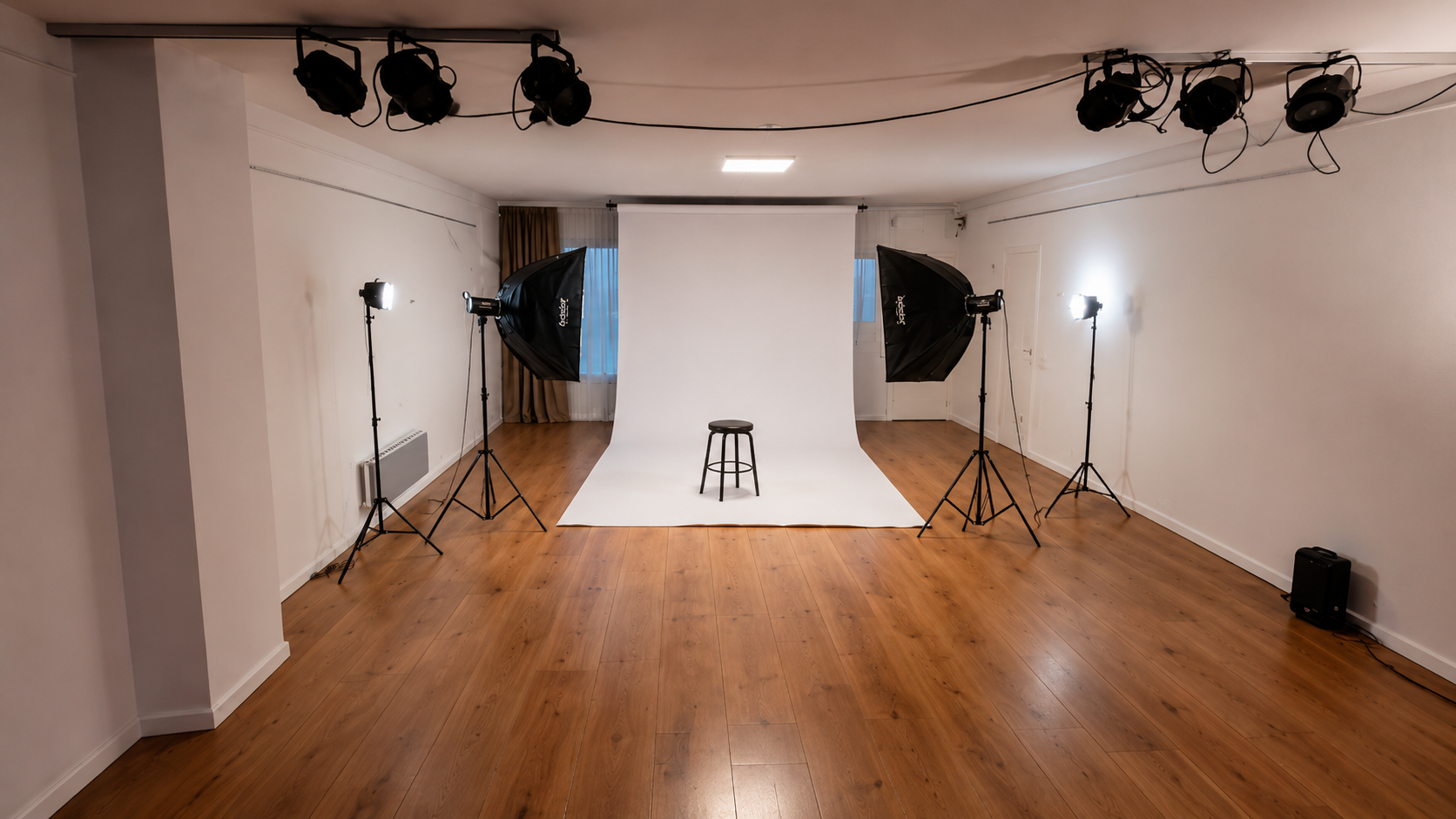 Studio photo avec fond blanc et &eacute;clairage professionnel